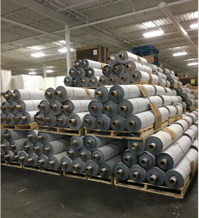 Container loaded with PVC leather and textile material rolls